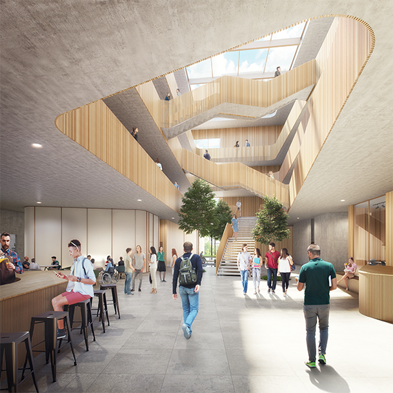 Från staden rör du dig in på en lummigstensatt gata som leder till en inre allé från huvudentrén till receptionens atrium, hjärtat av campus. Bild: Jordens Arkitekter