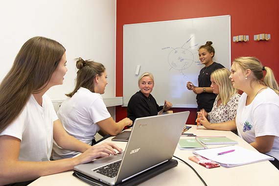 Students at the white board
